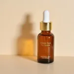 Close-up of Amber Time Eye Elixir bottle