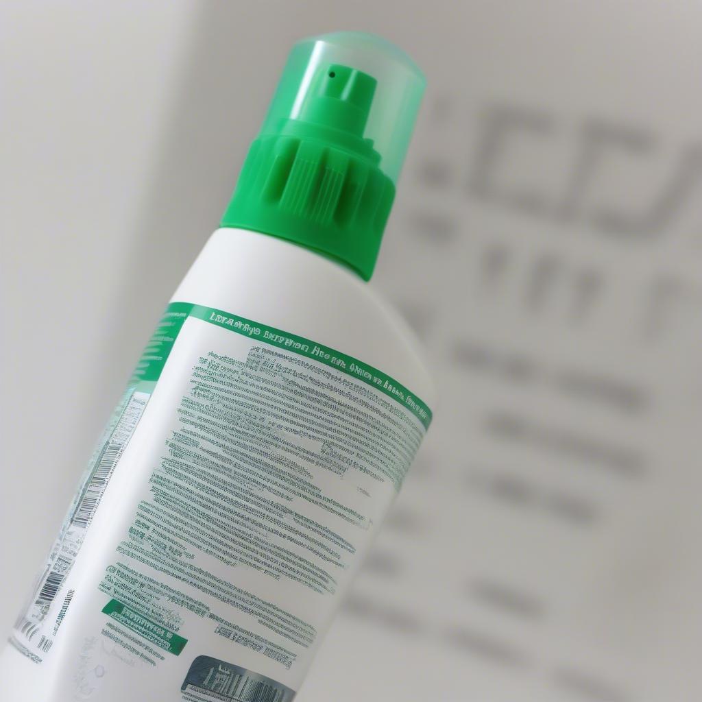 Close-up of ingredients list on an anti-itch spray bottle