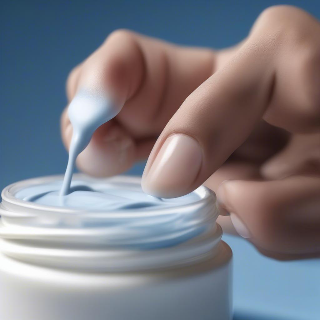 Applying Blue and White Lotion to Hand