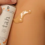 Applying Btan Tanning Oil