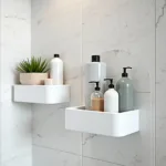 Modern ceramic shower shelves in a tiled bathroom