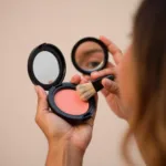 Applying Makeup Using a Compact Mirror