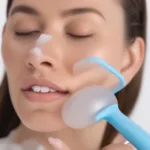 Woman Using Ice Roller on Face