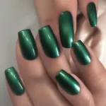 Various shades of green shimmer nail polish on different nail shapes