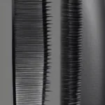 Close-up view of a hard brush designed for wave styling