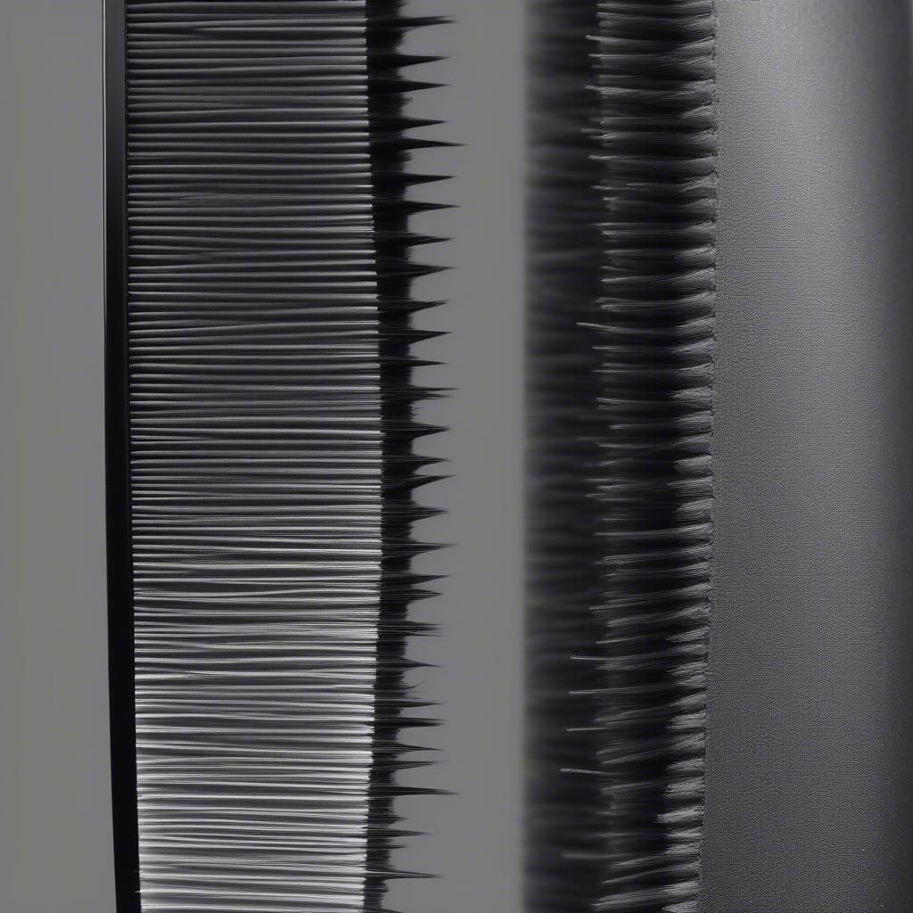 Close-up view of a hard brush designed for wave styling