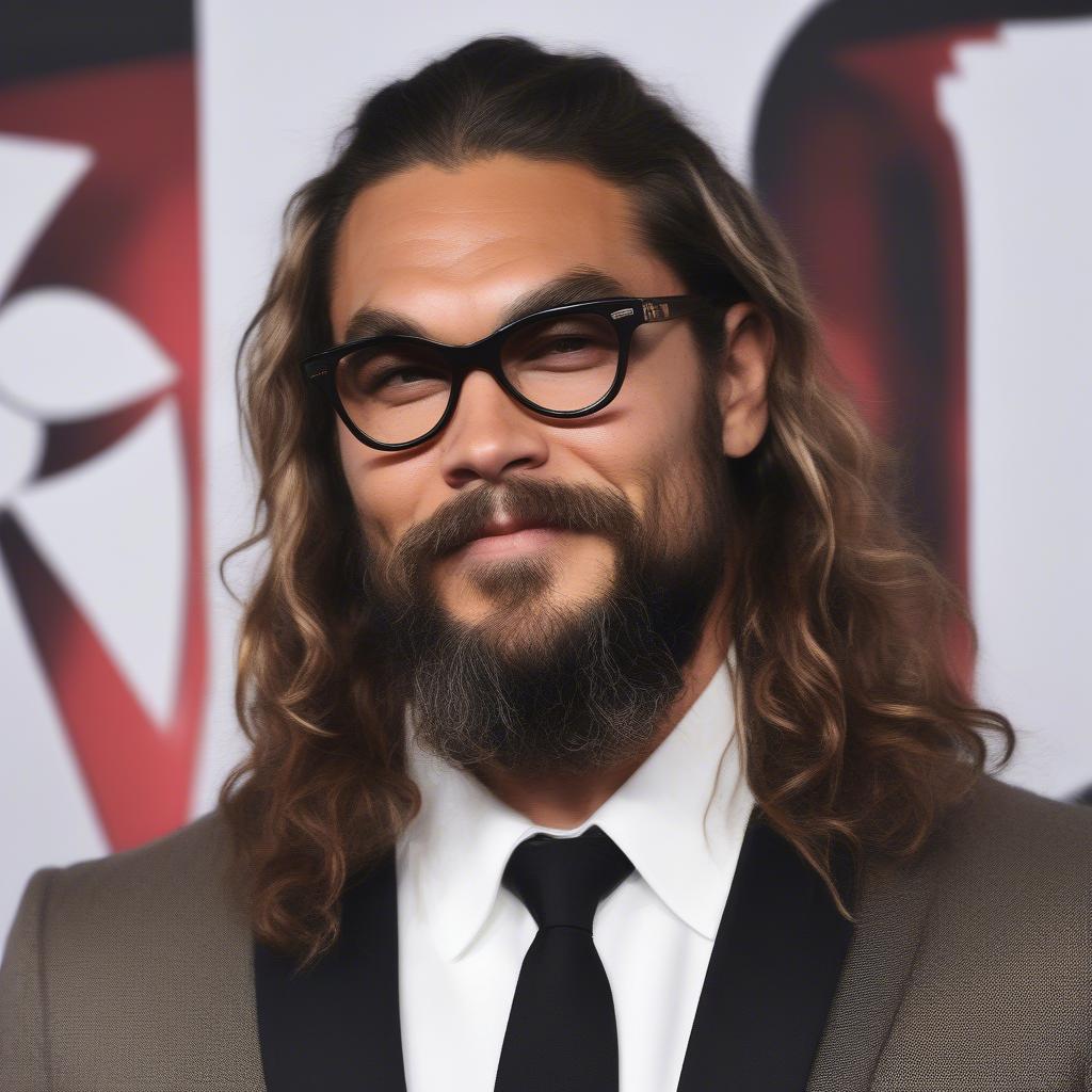 Jason Momoa in Stylish Glasses at a Premiere