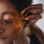 Applying Mafura Oil to Hair