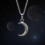 Moon Phase Necklace Birthday Gift: A silver necklace with a crescent moon pendant reflecting a specific moon phase.