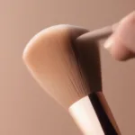 Applying Foundation with a Paddle Brush