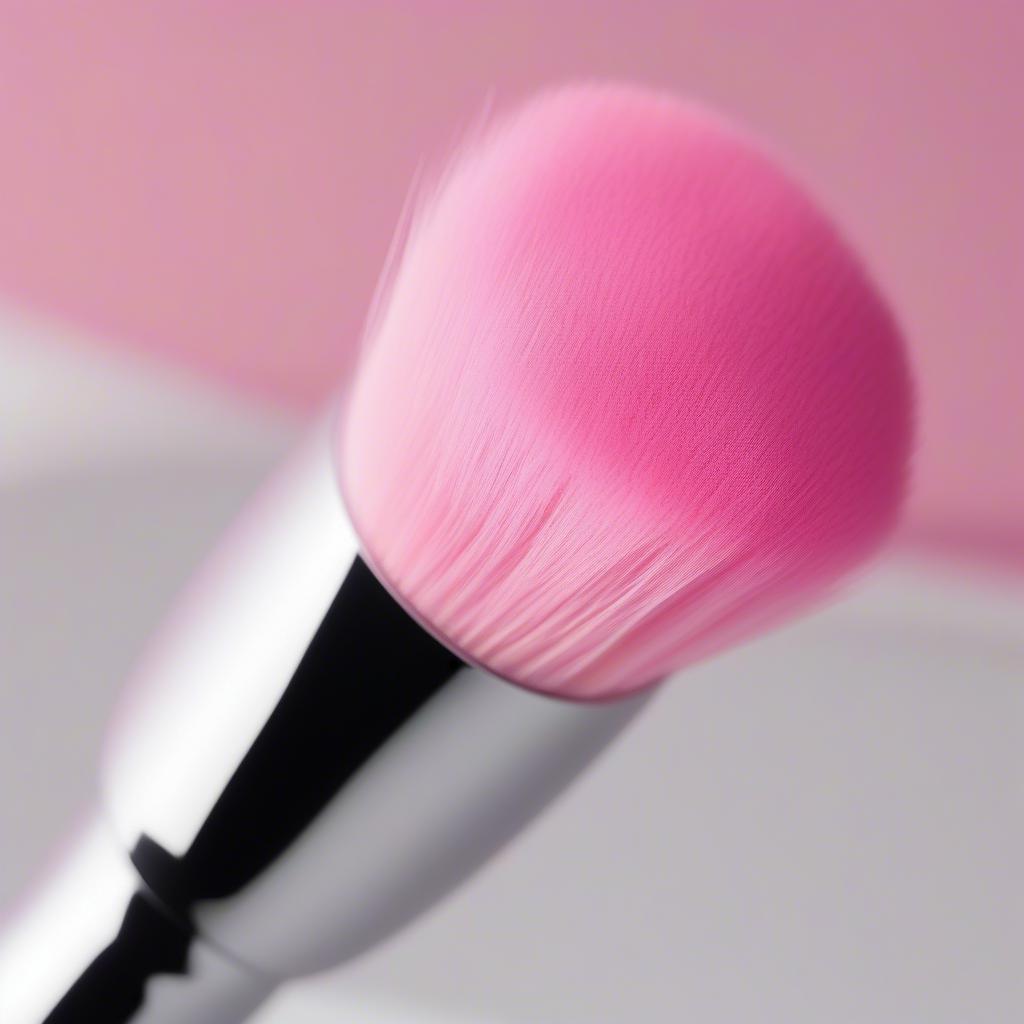 Pink Round Makeup Brush on White Background