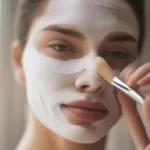 Woman Applying a Plumping Face Mask