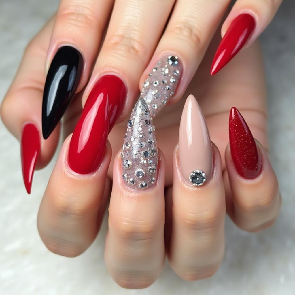 Various stiletto nail designs showcasing different colors, lengths, and embellishments