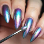 Applying Unicorn Chrome Powder to Nails