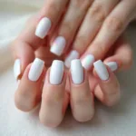 White Iridescent Nail Polish on Hands