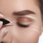 Applying White Kohl Eyeliner