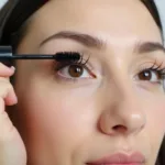 Applying Volume Up Mascara for Dramatic Effect