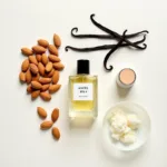 Natural ingredients used in creating angel milk perfume, including vanilla beans, almonds, and musk.