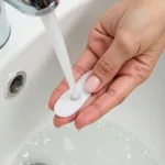 Cleaning a glass nail file with soap and water