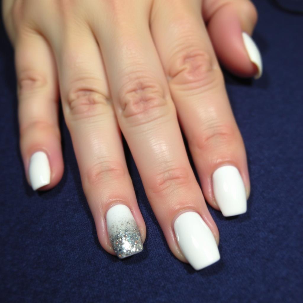 Frosty White Nails with Glitter Accent