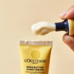 L'Occitane Shea Butter Hand Cream Review - Close-up of the iconic hand cream tube and its rich texture.