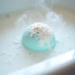 Lush Snow White Bath Bomb Fizzing in a Bathtub