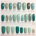 Ocean color nails in various shades of blue and green, from deep teal to light aqua, showcasing different nail shapes and lengths.