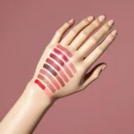 Lipstick swatches on a replica hand