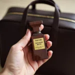 Tom Ford Oud Wood Travel Size in Hand