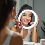 Woman Using a Battery Operated Makeup Mirror