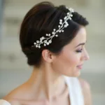 Bride with short hair wearing a delicate hair vine